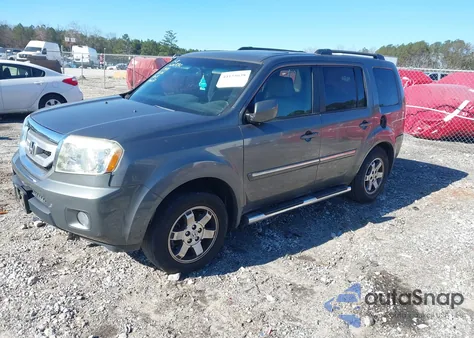 2009 Honda Pilot Touring z USA, uszkodzony, nr VIN 5FNYF48989B020930